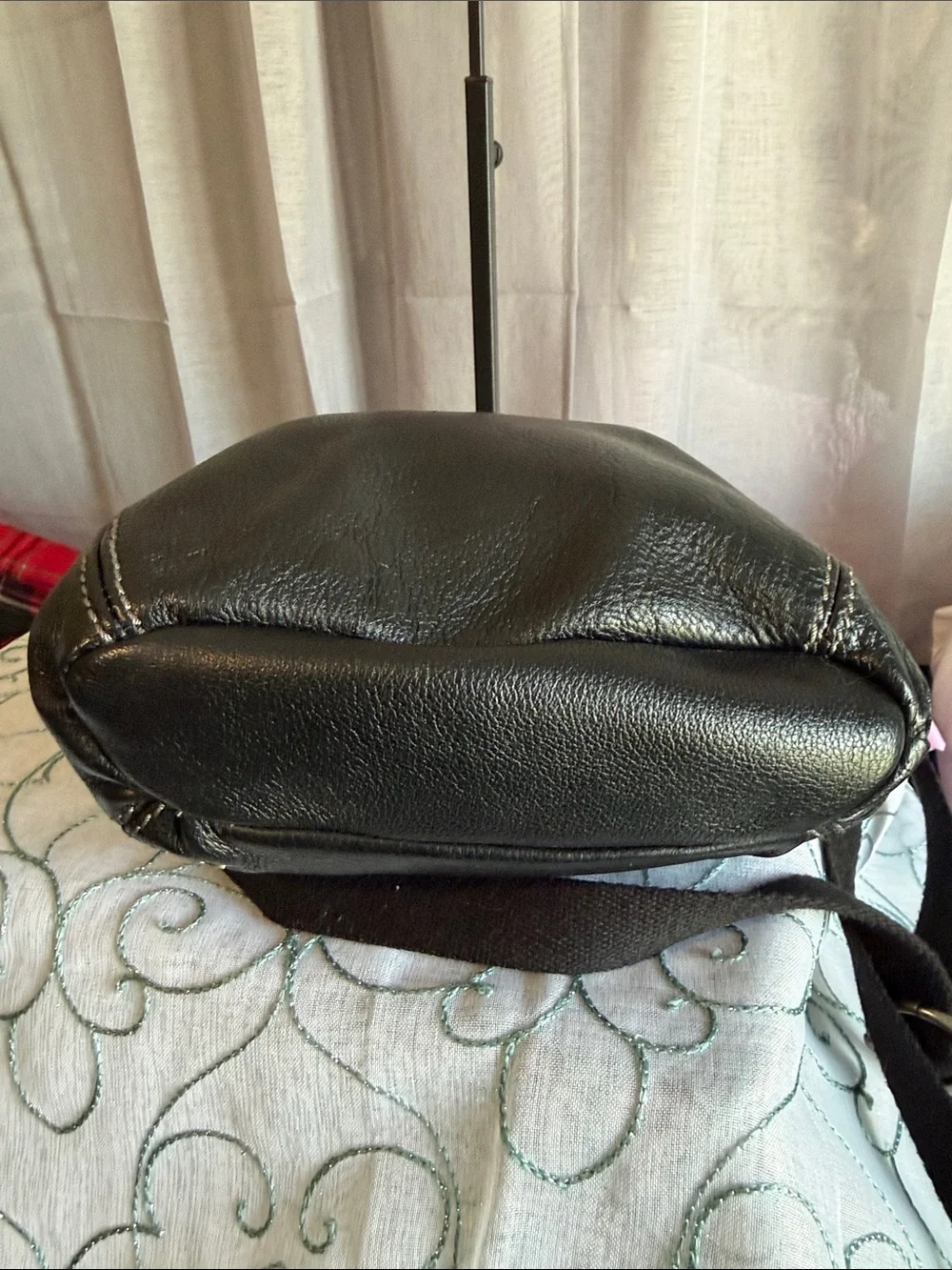 The Sak Black Pebbled Leather Messenger Bag with Fabric Strap